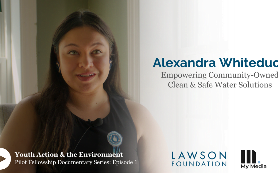 A still capture image of Alexandra Whiteduck sitting for her interview. Text across the image reads: Alexandra Whiteduck, Empowering Clean and Safe Water Solutions. It is additionally noted that this is episode 1 of the Youth Action & the Environment Documentary Series, and the logos of the Lawson Foundation and My Media Creative (the documentary producers) appear.