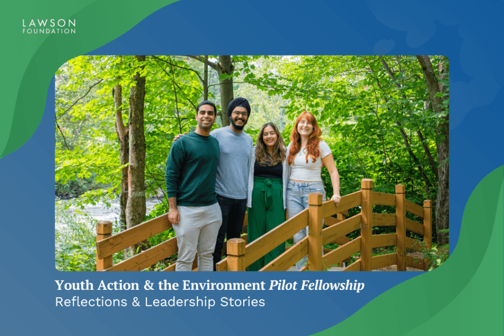 Four young people stand together on a wooden footbridge in a lush green forest, smiling at the camera. Title text below reads 'Youth Action & the Environment Pilot Fellowship — Year 2 Reflections & Leadership Stories.' The Lawson Foundation logo appears in the corner.